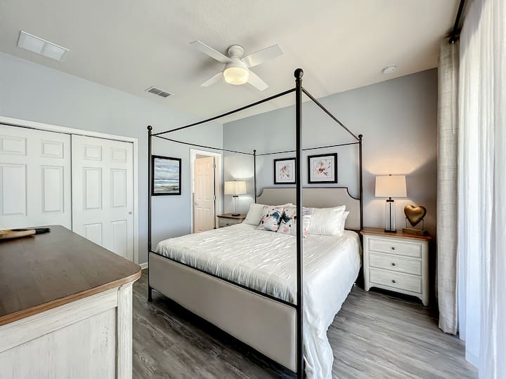 Master bedroom #1 features a king bed and new luxury hard-surface flooring