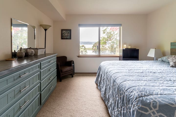 downstairs king bedroom #1 with Hood Canal and lagoon view and  LUXURY DAVENPORT HOTEL KING MATTRESS
