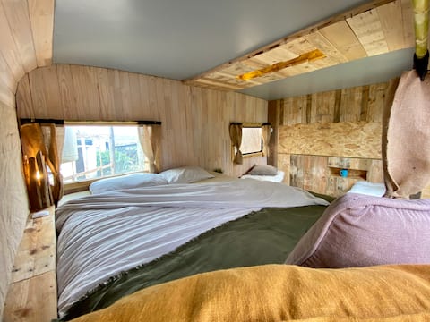 Cosy caravan with private bathroom and garden.