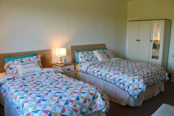 Twin Bedroom: 1 double bed and 1 single bed 