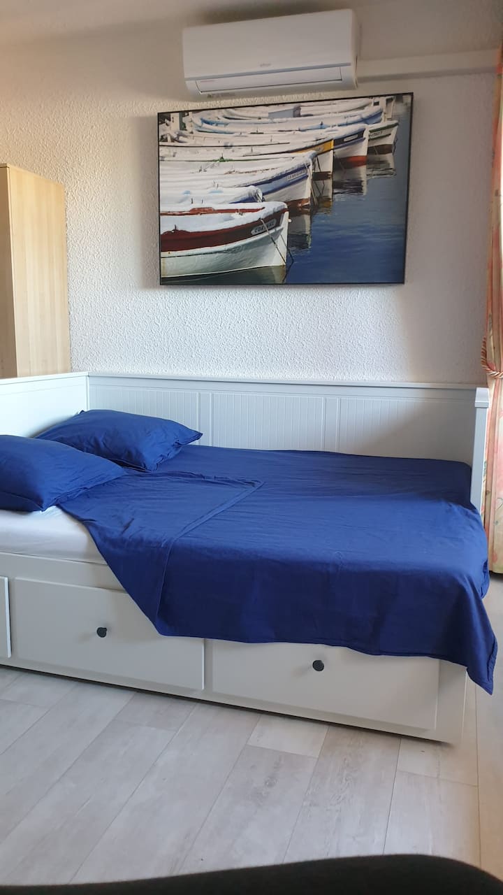 Sofa bed with new parquet floor