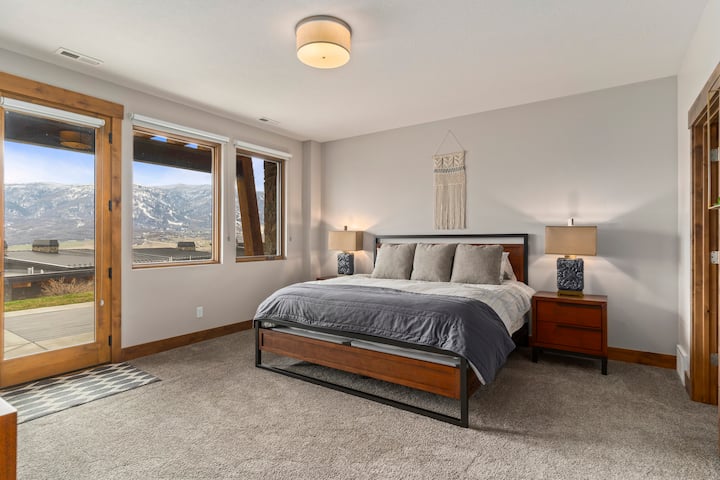 Bedroom number 3 with bathroom and walk out door.