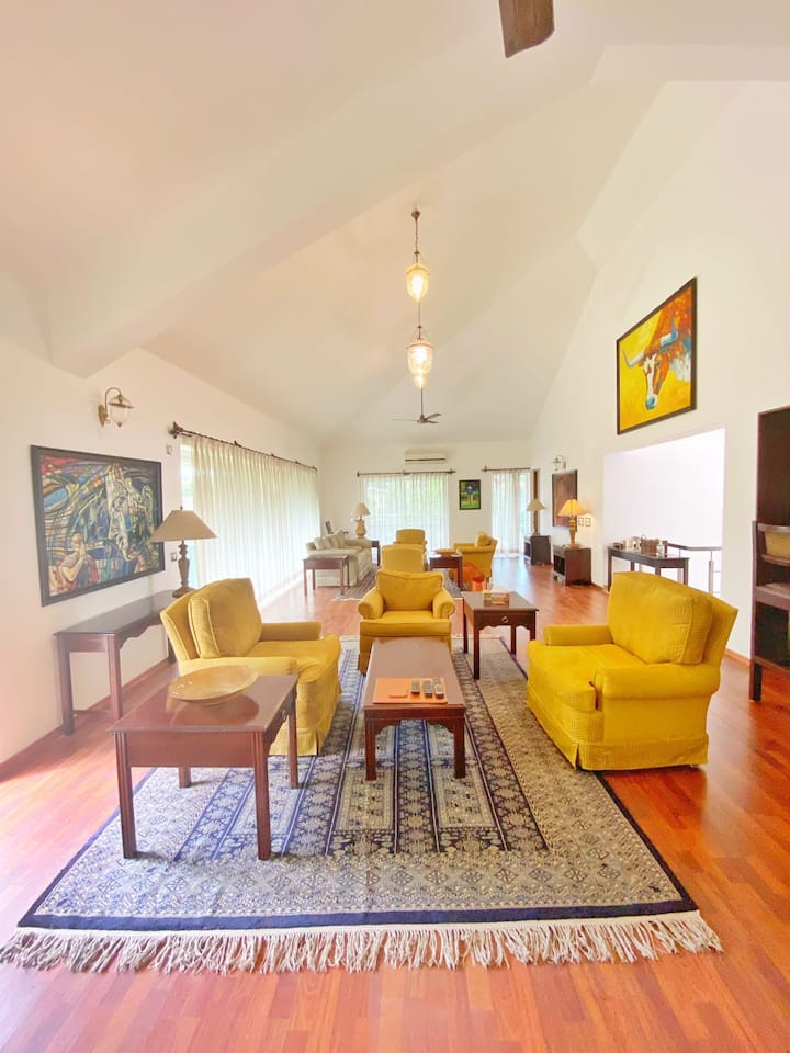Our Living Area with plenty of natural light and a private bar and plenty of space to have a great time with family and friends.