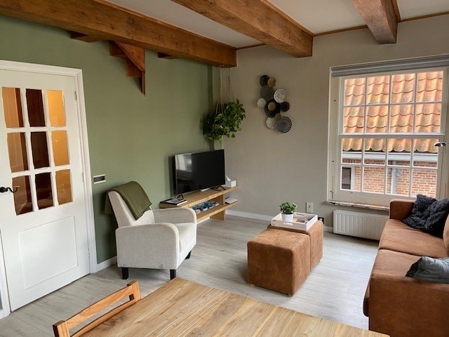 Popular Airbnb listing: Apartment with a view of Waagplein (Cheese Market) in Binnenstad Oost