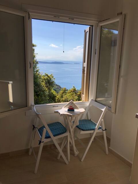 Spectacular sunset in a confortable cycladic house