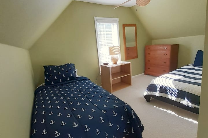 Bedroom #2 - "Open Loft" with two twin beds, alarm clock, dresser, night stand, Central HVAC and ceiling fan. Note: Loft has no door.