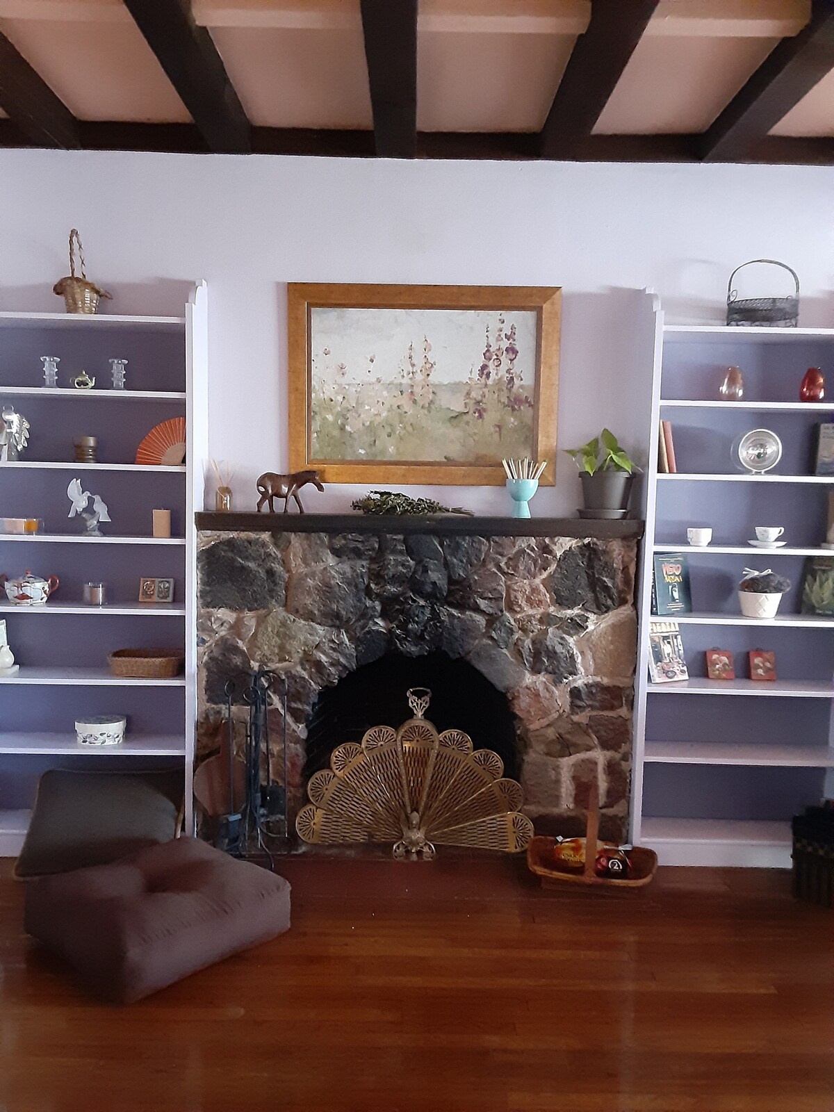 Fieldstone wood-burning fireplace built by original owner/builder, UA Music Professor Rollin Pease.