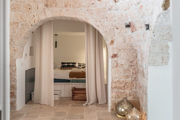 Bedroom 2, located in the alcove of Trulli