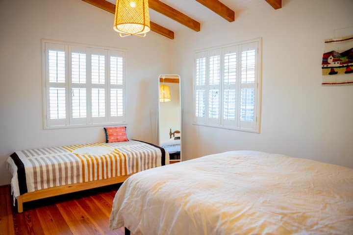 Large third bedroom has stackable daybed that can be unstacked to two twin beds. Extra linens and pillows in closet.