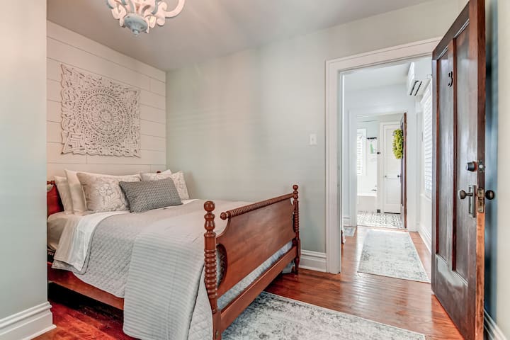 Settle in for sweet dreams in Bedroom 3’s charming full-size spool bed with beautiful
dresser and mirror set.