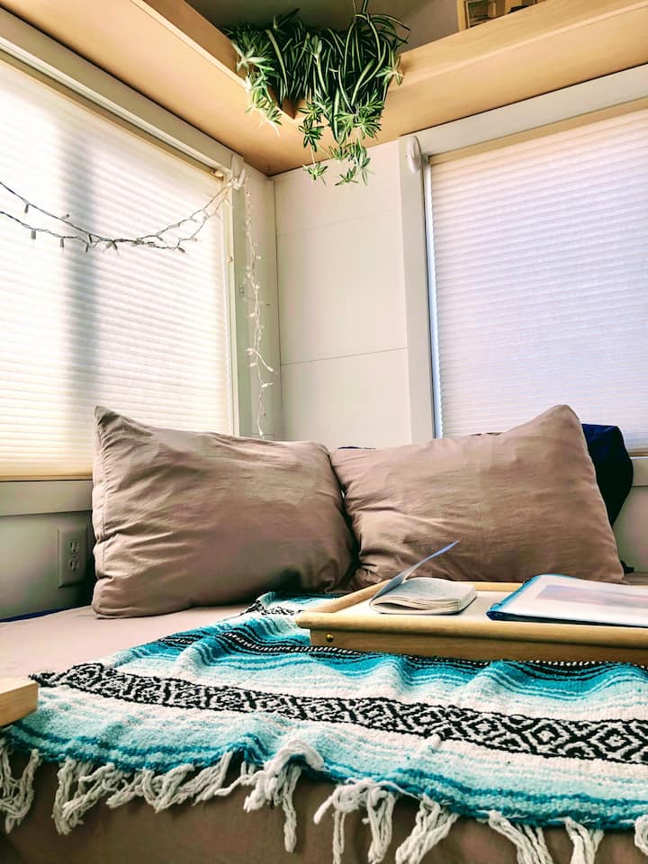 Lounge on our Tuft and Needle bed