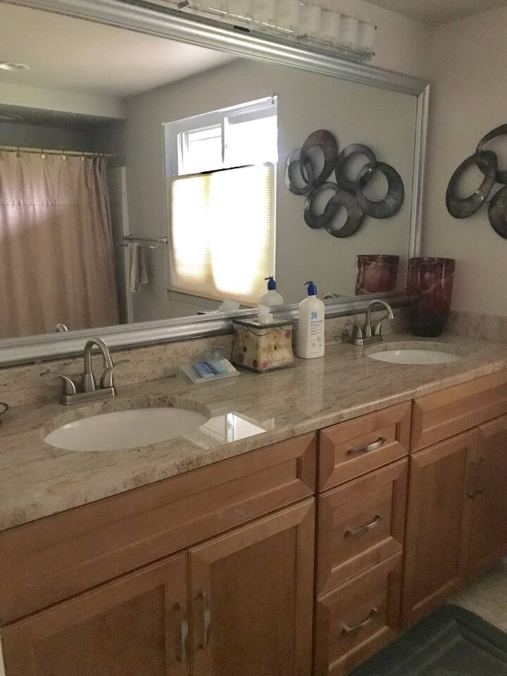 Private Full bathroom with tub, new hand held shower and amenities
