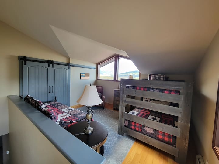 Large bunkroom located at the top of the stairs, just outside the master suite.