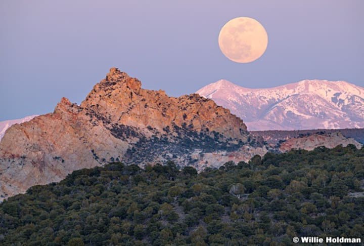 Cocks Comb and the Henry mountains with full moon!