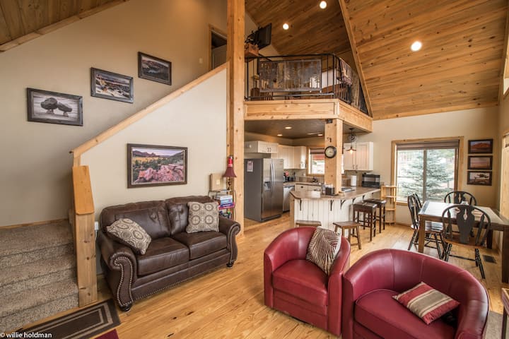 From front door, living room, kitchen area.