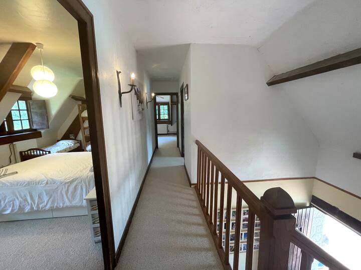 Upstairs landing, showing bedroom 3 on the left, bedroom 2 at the end of the landing and the bathroom to the right.
