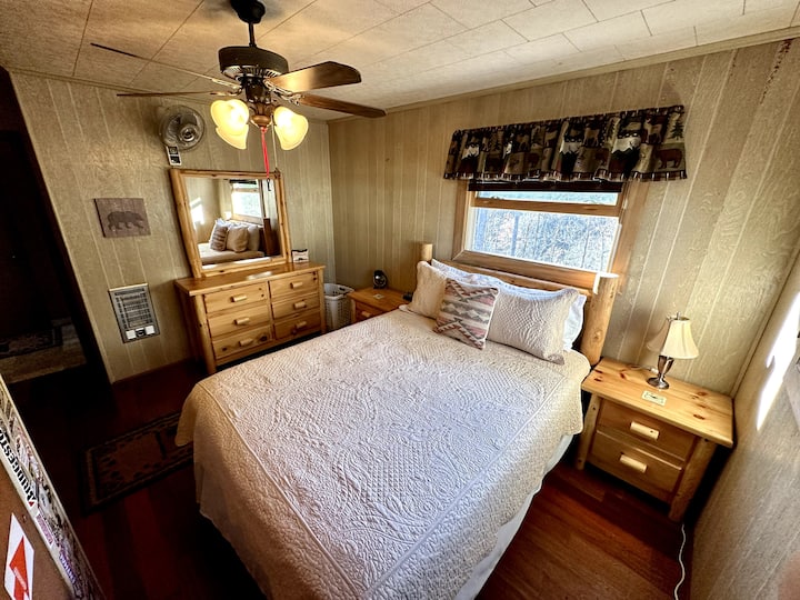 Back bedroom with closet and two dressers for storing your clothes.