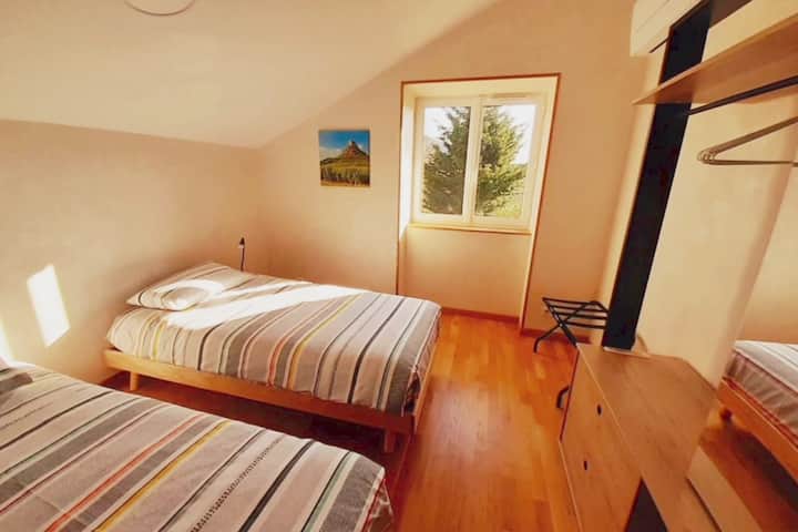 Welcome to the 2nd bedroom! It includes 2 single beds and an ice cabinet. Air conditioning will ensure you have beautiful nights in summer:)