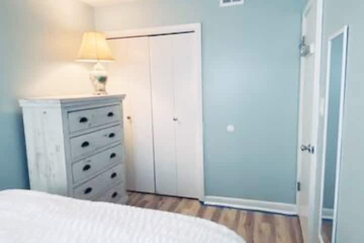 Guest queen bed with full dresser and closet space. 32" smart TV for streaming .