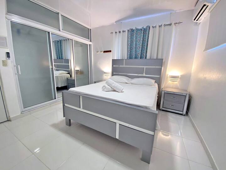 Master Bedroom
-Smart Tv 43 inch With Free Nexflix
-Air Conditioner
-Wardrobe with big mirror
-Comfortable Queen size Bed
-Blackout curtains