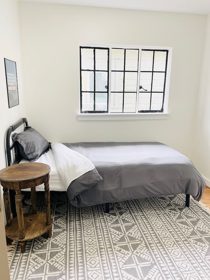 This is the smaller bedroom with a twin extra-long bed and small closet (not pictured).