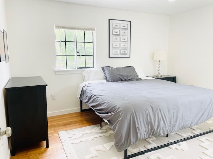 Directly behind the primary bedroom is this large bedroom with a king bed.
