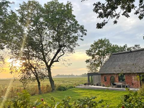 Thatched roof house "Altes Schulhaus" with panoramic views