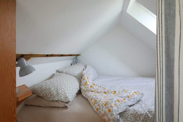 La zona de dormitorio de arriba.