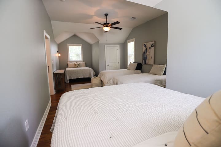 Bedroom 3 Upstairs with 1 Queen, 1 Full, and 2 Twins.