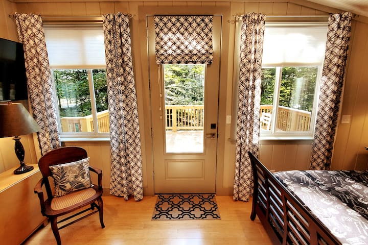 The back entrance to the rear patio is located in the master bedroom.