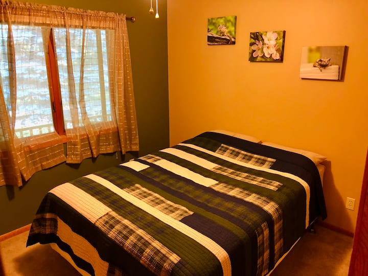 Bedroom #3. A small closet and dresser are provided. 