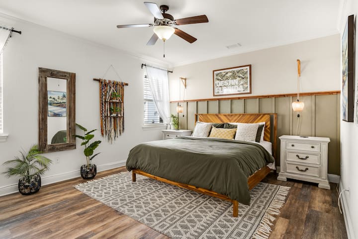 Cozy master bedroom. Boasts a beachy boho look and feel for a relaxing sleep.