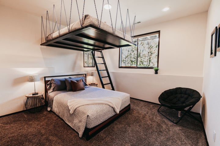Downstairs bunk room with 2 Queen beds