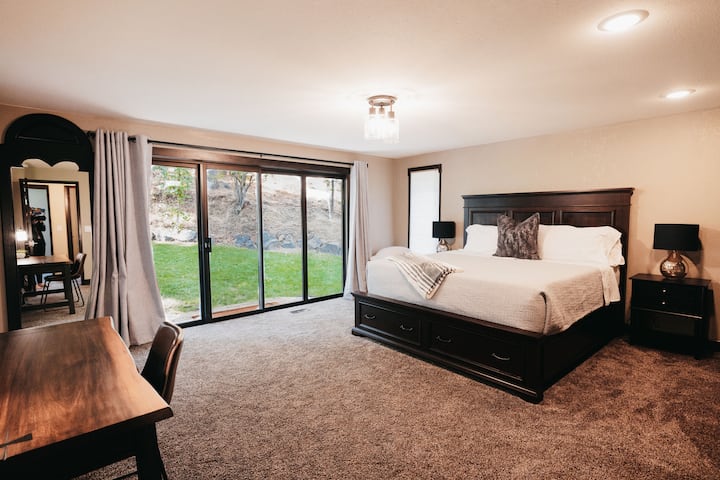 Master bedroom with desk space and adjoining bathroom (not pictured)