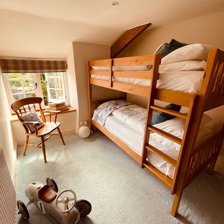 Second single room with bunk beds and high end mattresses suitable for adults.