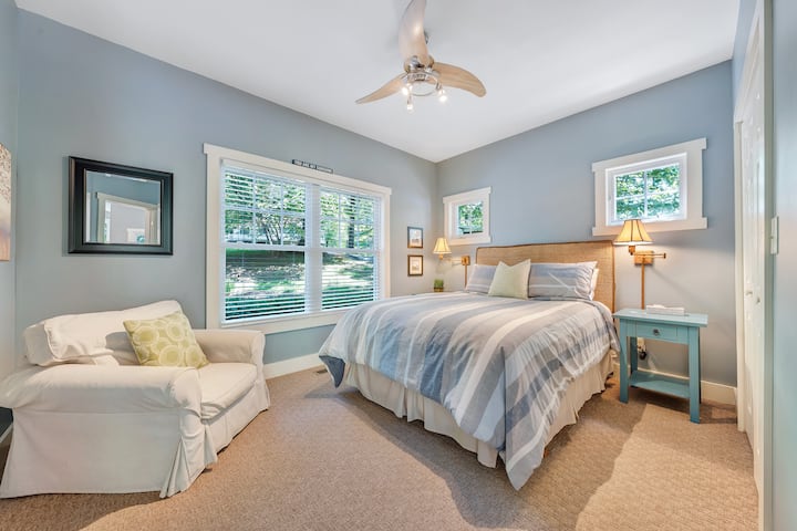 Main floor queen bedroom with detached bathroom right next door. 