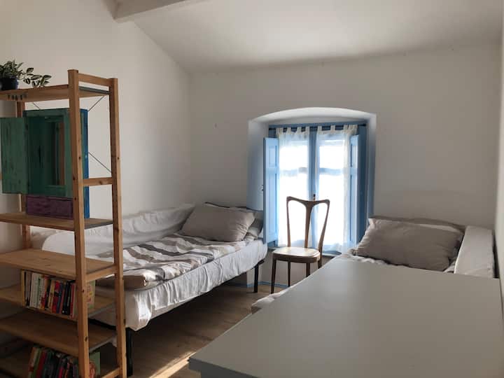 The upstairs bedroom has two proper single beds. Two extra junior beds are available for children under 12.

In this bedroom there is also two dressers, a bookcase, and a desk.