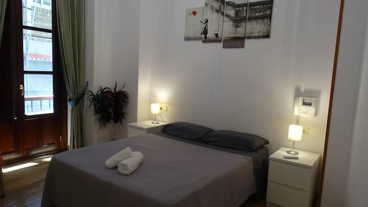 Master bedroom with high ceilings, large closet and AC.