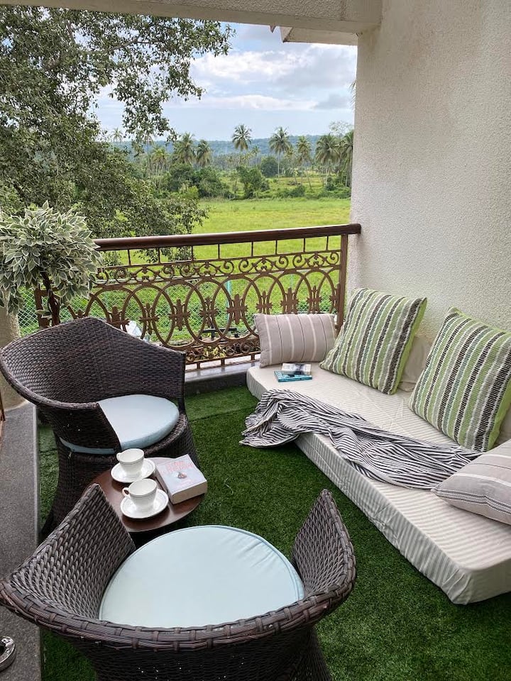 Balcony overlooking the fields - Ideal way to chill during the day or watch the sun set!