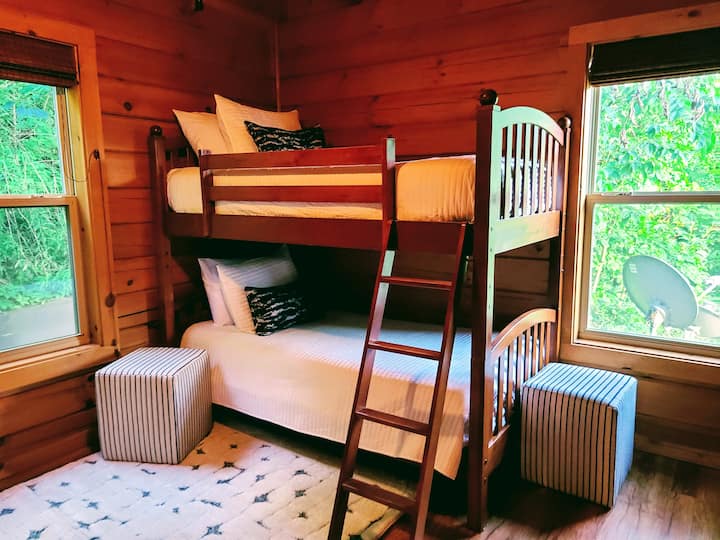 Here is the other main level bedroom that has one set of bunk beds. There is also a TV in all the bedrooms.