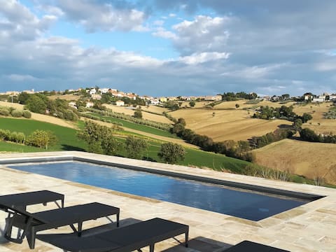 Agritursmo  with beautiful view and swimming pool.