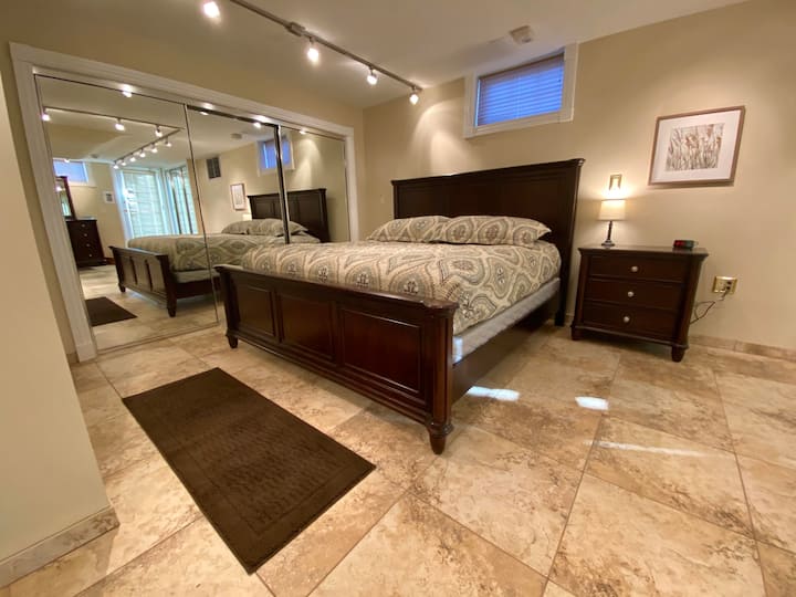 Downstairs Master Bedroom King Bed and Closet Area