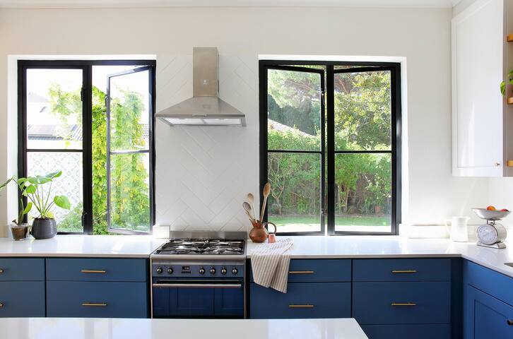 Open plan living beneath majestic mountain views gallery image 5