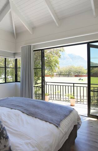 Open plan living beneath majestic mountain views gallery image 4
