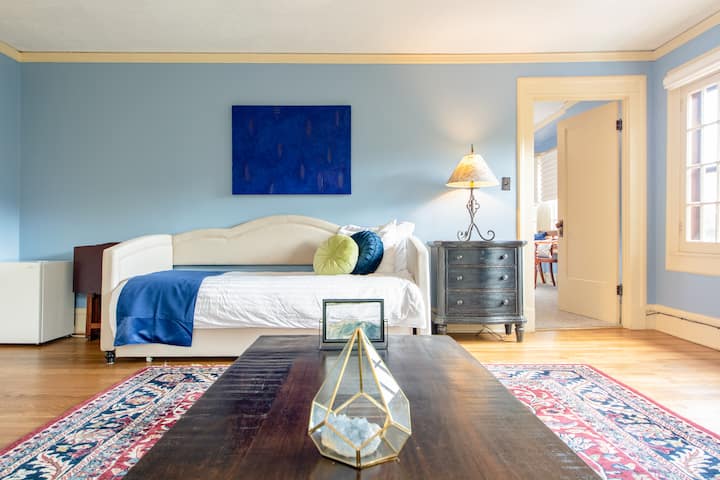 East trundle bed in the Rockledge Suite + entrance to the inner room with king bed and full bathroom. This Room Sleeps 4 guests, the bottom trundle slide out from under the top trundle