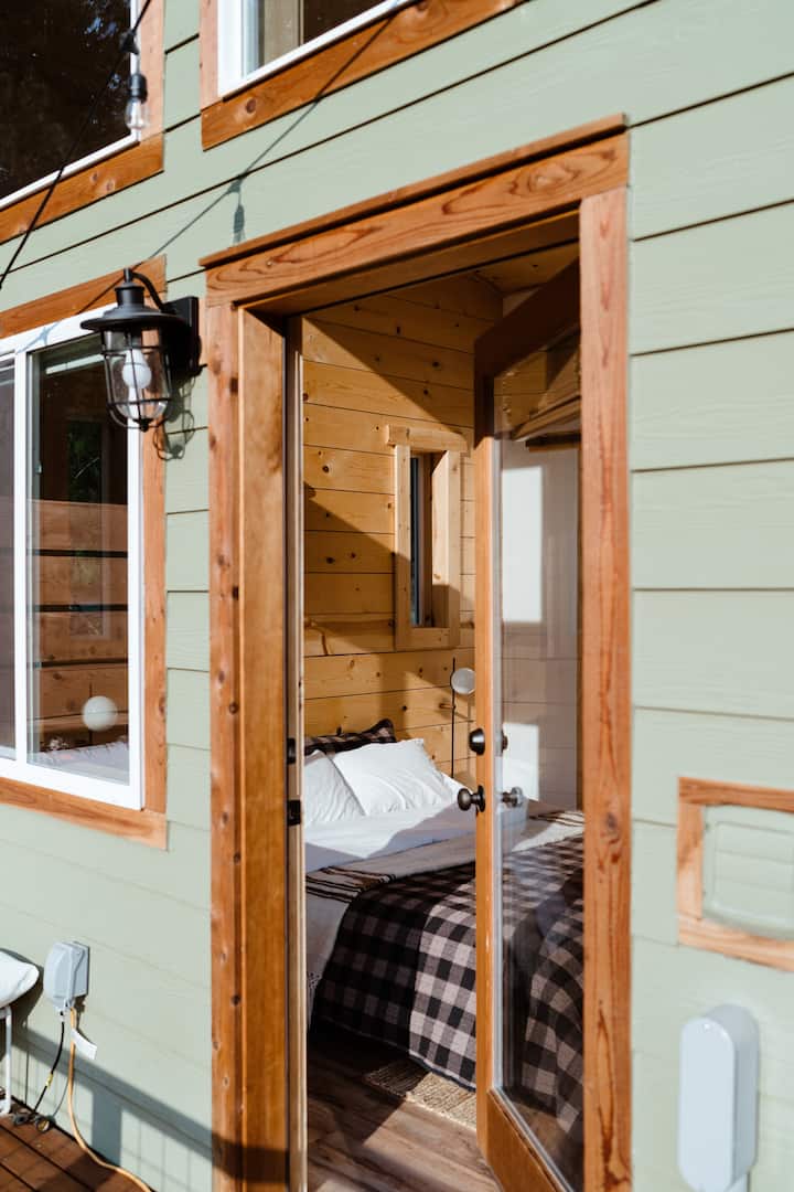 Peekaboo shot of upstairs bedroom from deck