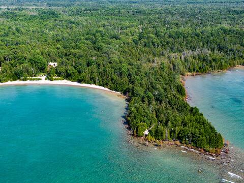 Secluded 1200' beachfront private 64 acre log home