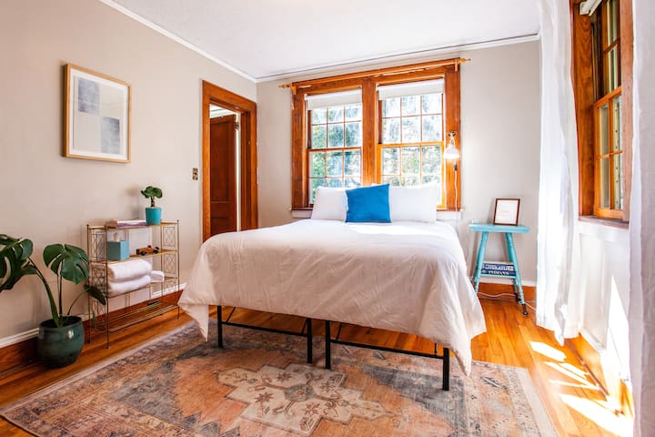 Bedroom number two is at the back of the house and includes another walk-in closet & blackout shades.