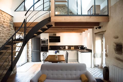 House combining old, contemporary with garden