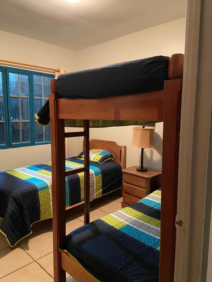 Bedroom 2 - twin bed and twin bunk beds.